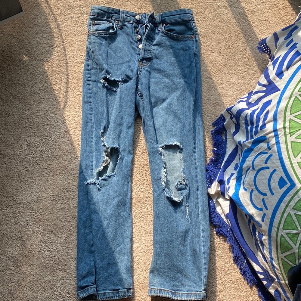 high rise blue ripped jeans
